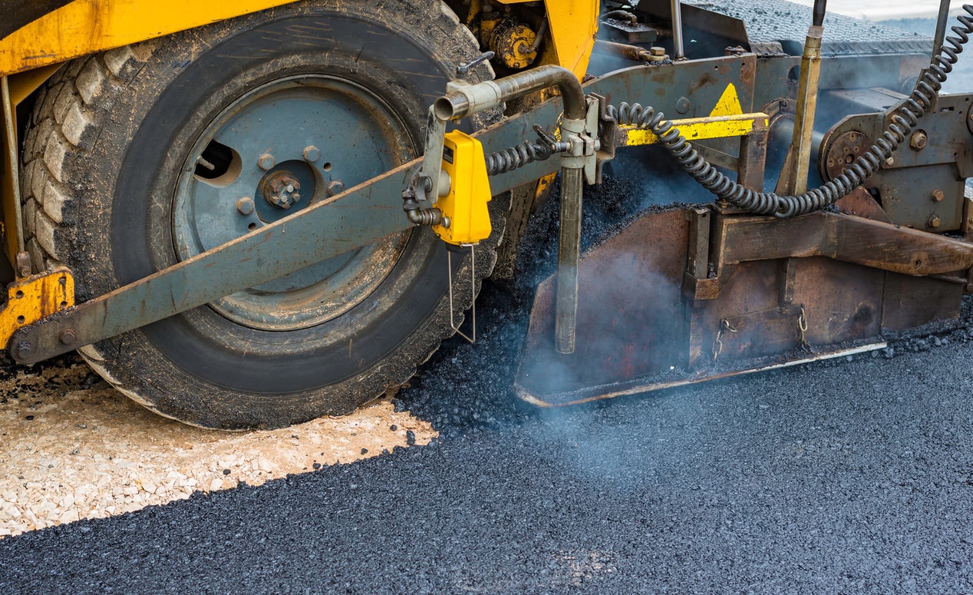 GSP Asphalt Paving crew compacting new asphalt in Toms River, NJ